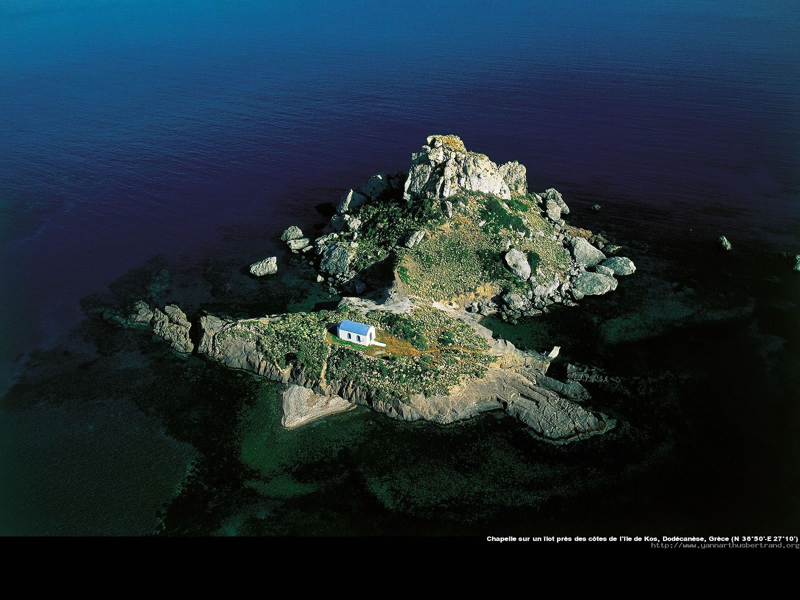 Chapel on an islet off the coast of Kos, Dodecanese, Greece.jpg