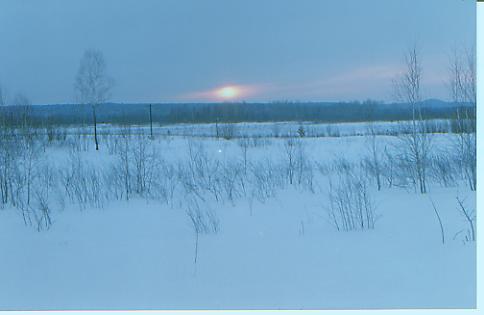1997.03.05从黑河到塔河途中。雪原日落之前.jpg