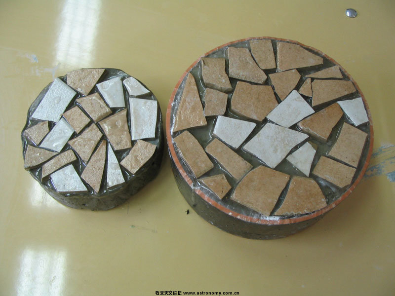 Pair_of_unused_tools_for_grinding_mirrors_(Korenica,_Croatia).jpg